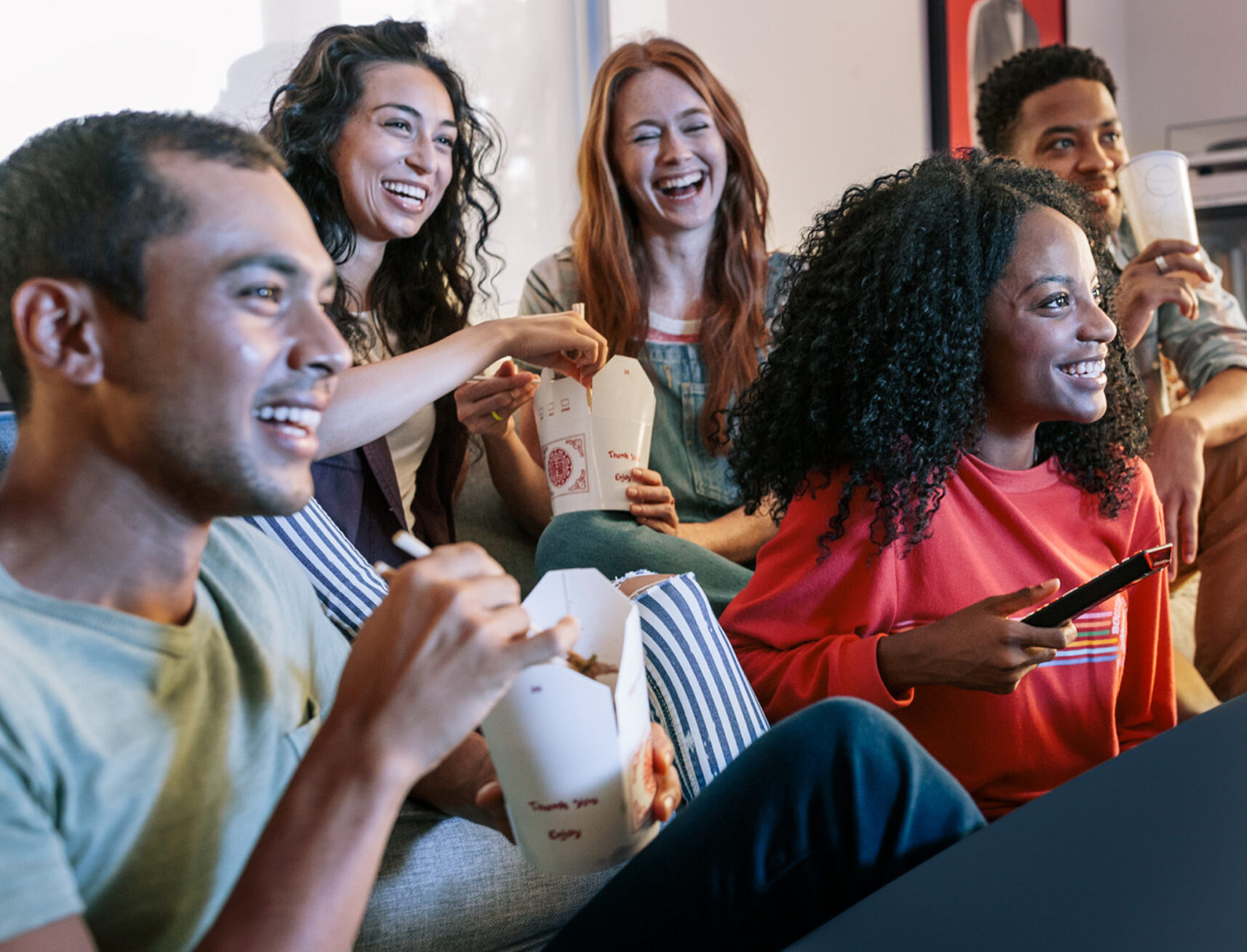 people enjoying a movie and popcorn